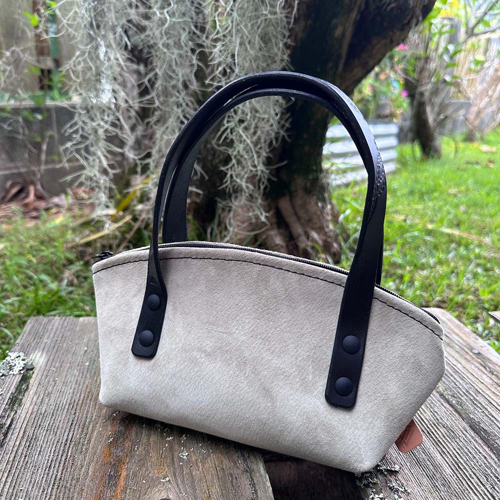 last state leather's suede mini handbag in slate with black handles profile view